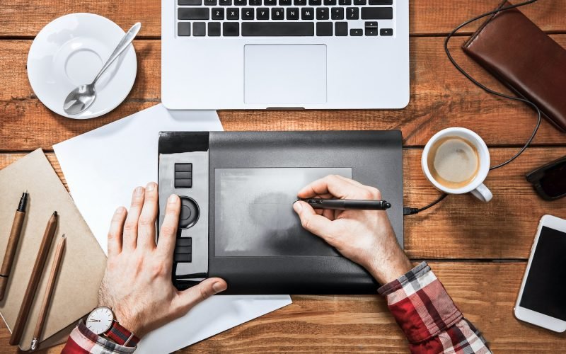 graphic-designer-working-with-interactive-pen-display-digital-drawing-tablet-and-computer.jpg graphic-designer-working-with-interactive-pen-display-digital-drawing-tablet-and-computer.jpg